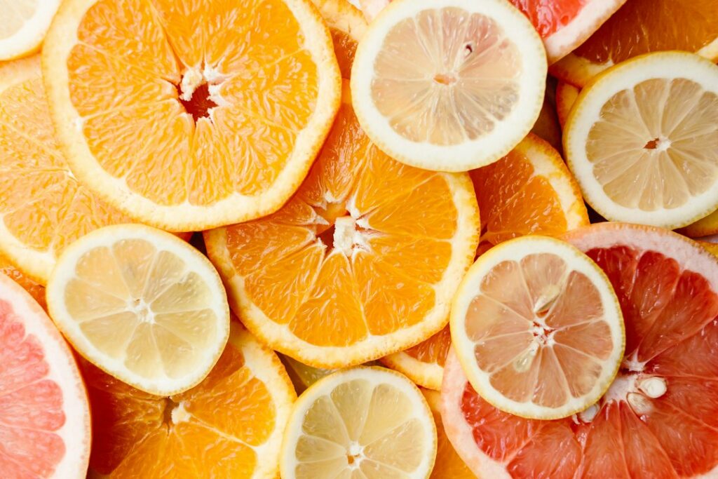 Sliced oranges, lemons and limes, the citrus fruits behind bergamot and citrus perfume notes
